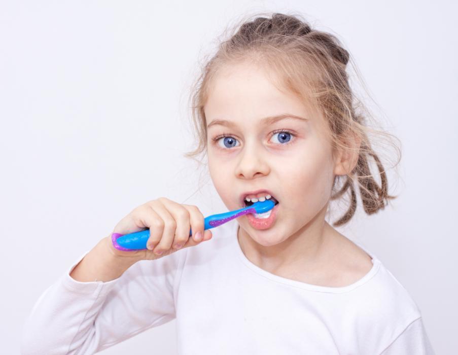 a girl brushes her teeth | children's dentist pascoe vale