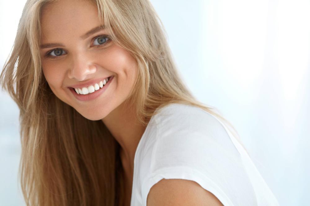 a woman smiles | pascoe vale invisalign