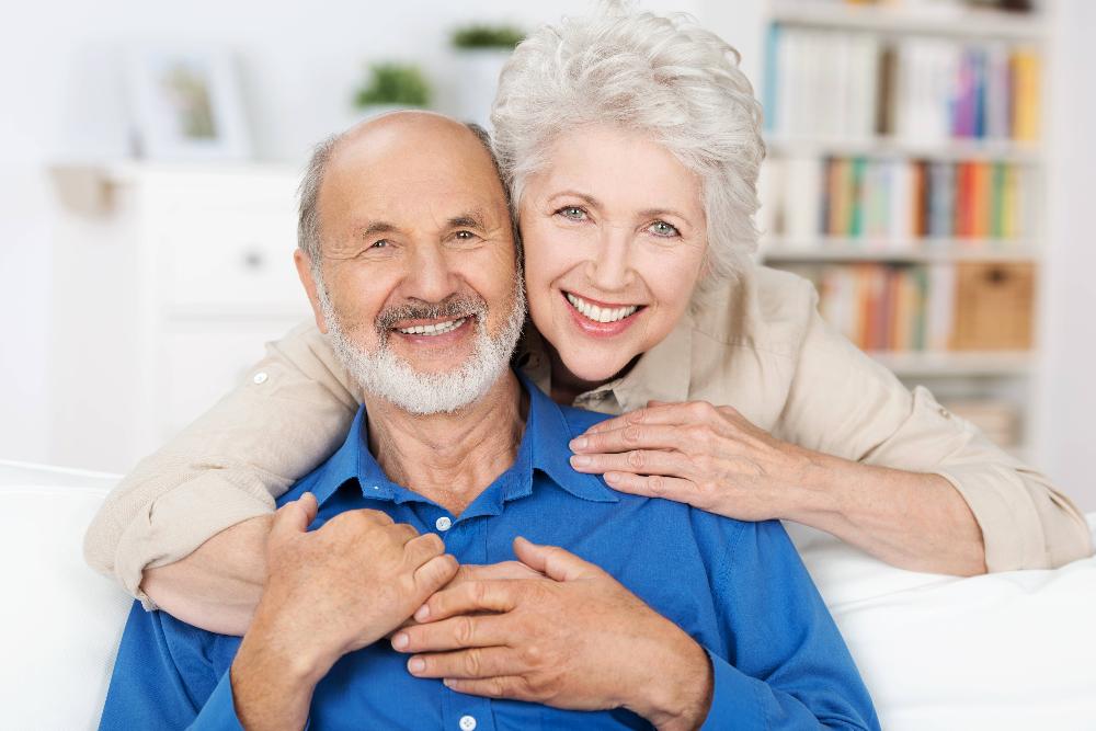 Older man and woman smiling after all on 4 implants, pascoe vale