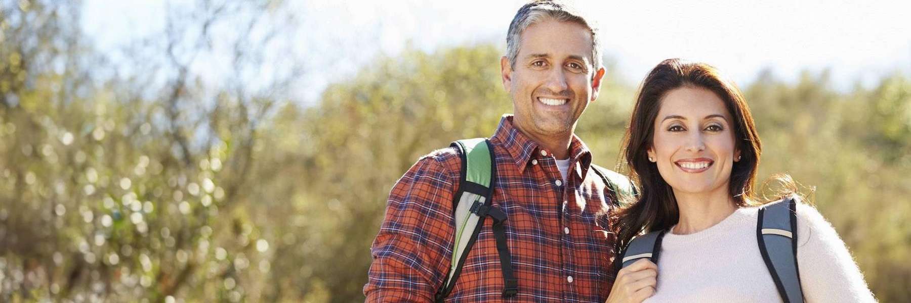 Pascoe vale indian middled aged couple smiling on a hike