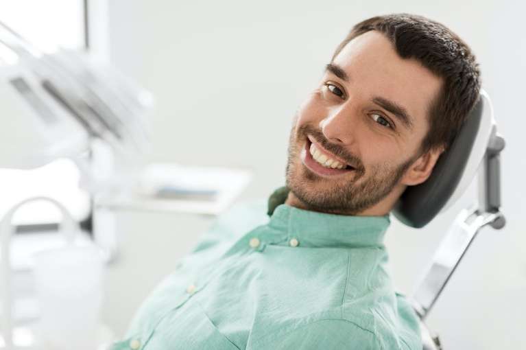 Man in dental chair smiling, pascoe vale vic
