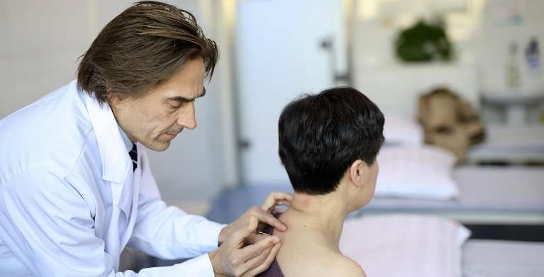 Man getting acupuncture in the back, pascoe vale vic