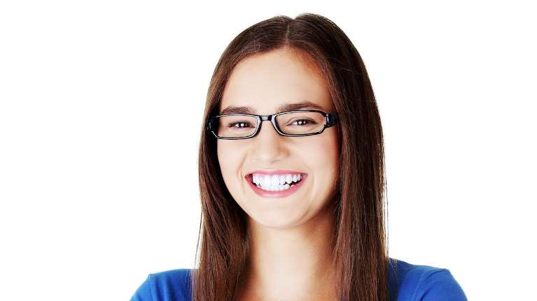 Girl with glasses smiling after invisalign, pascoe vale vic