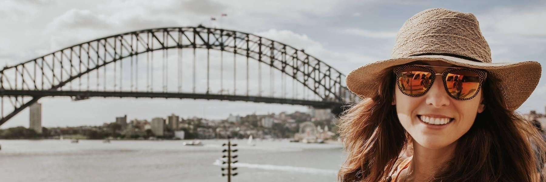 Pascoe vale woman smiling in front of bridge
