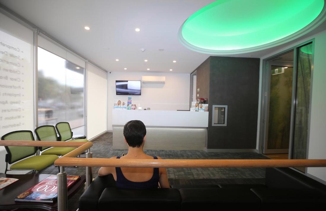 a woman relaxing while waiting for an appointment at or pascoe vale office